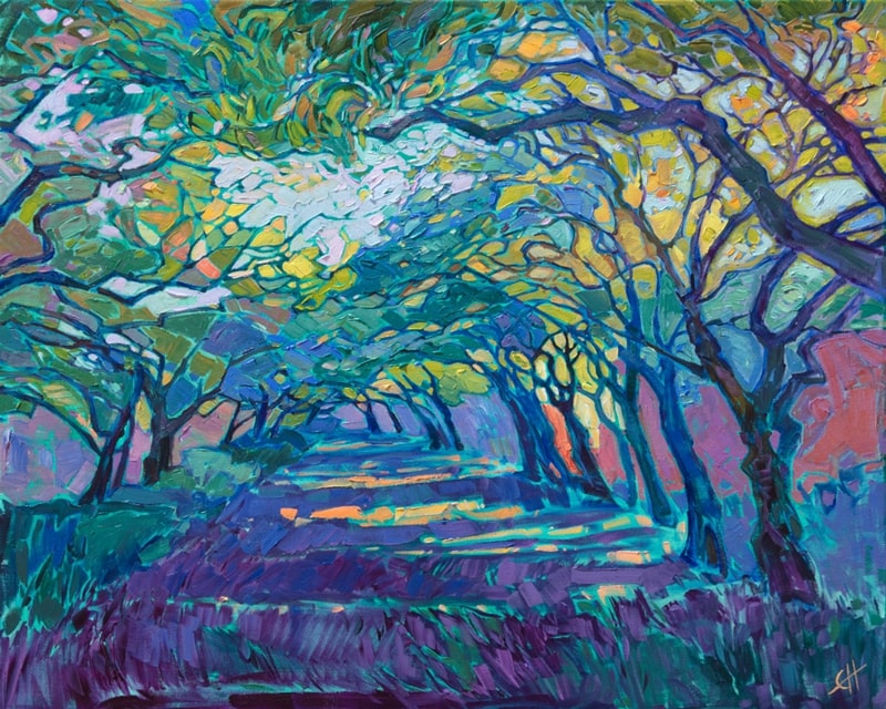 Vibrant tree-lined path in sunlight
